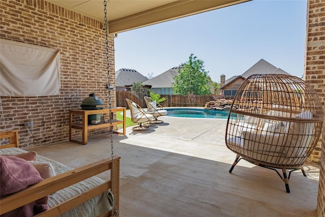 4300 Round Valley Ln, Fort Worth, TX 76262 - fenced backyard featuring grilling area and a patio