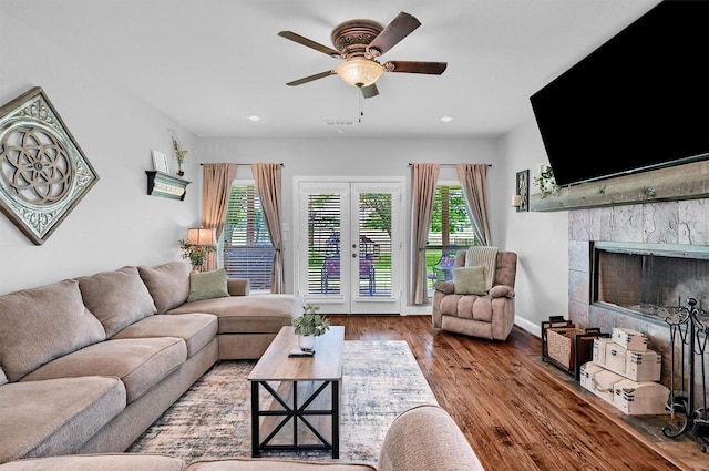 3006 Preston Club Dr, Sherman, TX 75092 - living room featuring ceiling fan, wood finished floors, recessed lighting, a high end fireplace, and french doors
