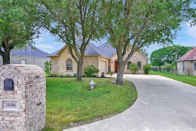 3006 Preston Club Dr, Sherman, TX 75092 - view of front of home featuring concrete driveway, stone siding, a garage, brick siding, and roof with shingles