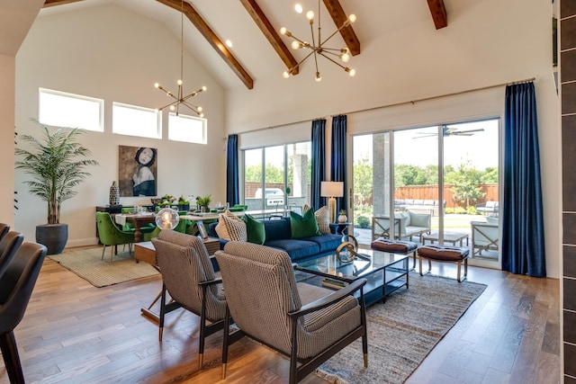 2203 Steed Run Dr, Mansfield, TX 76063 - living area featuring a chandelier, high vaulted ceiling, beamed ceiling, and wood finished floors