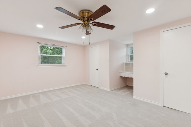 10328 Countess Dr, Dallas, TX 75229 - unfurnished bedroom with light carpet, recessed lighting, and ceiling fan