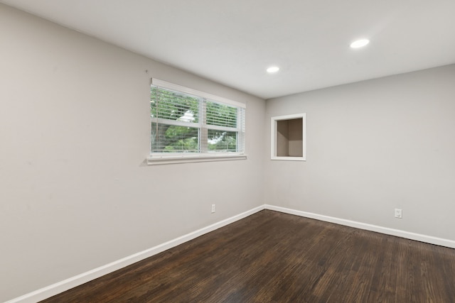 10328 Countess Dr, Dallas, TX 75229 - spare room featuring dark wood-style flooring and recessed lighting