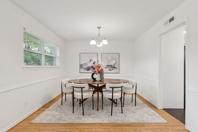 10328 Countess Dr, Dallas, TX 75229 - dining space featuring light wood-type flooring and a chandelier