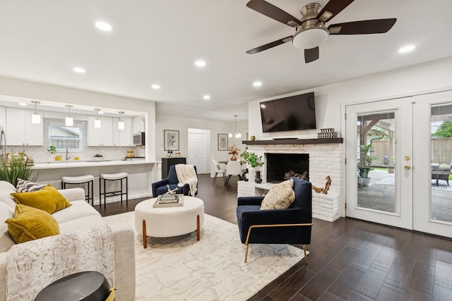 10328 Countess Dr, Dallas, TX 75229 - living room with plenty of natural light, recessed lighting, a ceiling fan, french doors, and dark wood-style floors