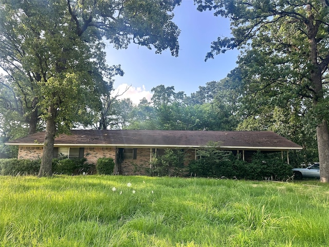 108 Mockingbird St, Mount Pleasant, TX 75455 - view of home's exterior with brick siding