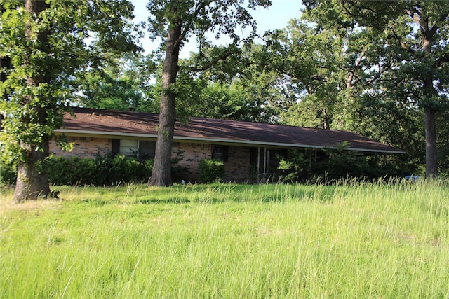108 Mockingbird St, Mount Pleasant, TX 75455 - view of home's exterior with brick siding