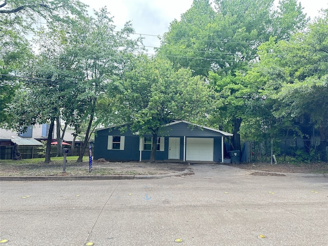 3801 Old Troup Hwy, Tyler, TX 75707 - view of front of home with a garage and driveway