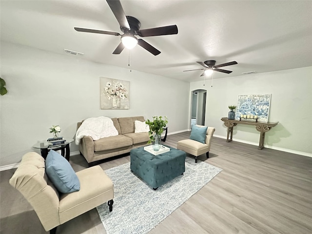 3801 Old Troup Hwy, Tyler, TX 75707 - living room with ceiling fan, wood finished floors, and baseboards