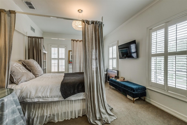 4205 Bryn Mawr Dr, University Park, TX 75225 - carpeted bedroom featuring ornamental molding, a chandelier, and baseboards