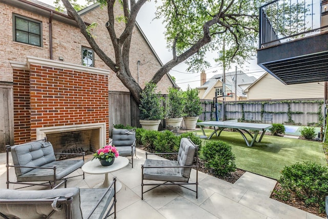 4205 Bryn Mawr Dr, University Park, TX 75225 - view of patio / terrace featuring an outdoor living space with a fireplace