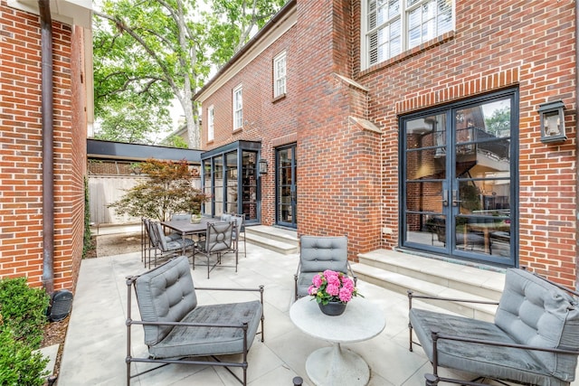 4205 Bryn Mawr Dr, University Park, TX 75225 - view of patio / terrace featuring french doors, an outdoor living space, and entry steps