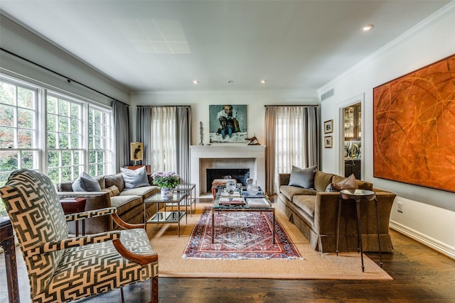 4205 Bryn Mawr Dr, University Park, TX 75225 - living room featuring hardwood / wood-style floors, a fireplace with raised hearth, crown molding, recessed lighting, and baseboards