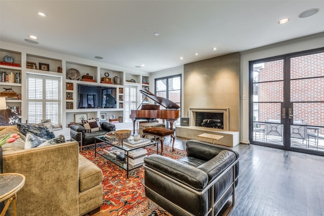 4205 Bryn Mawr Dr, University Park, TX 75225 - living room with wood finished floors, recessed lighting, crown molding, a fireplace, and built in features
