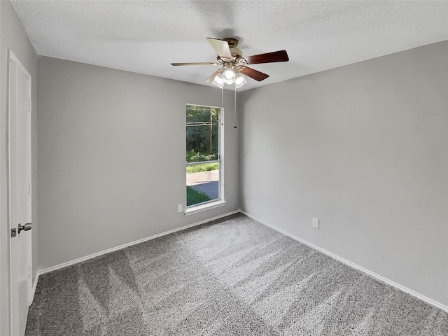 4800 Sugar Tree Ct, Arlington, TX 76017 - empty room featuring carpet flooring, a ceiling fan, baseboards, and a textured ceiling