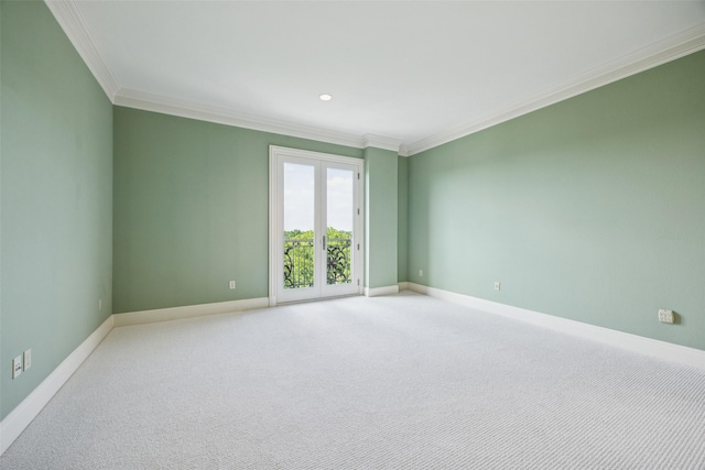 4240 Prescott Ave Unit 5B, Dallas, TX 75219 - unfurnished room with crown molding, baseboards, and carpet floors