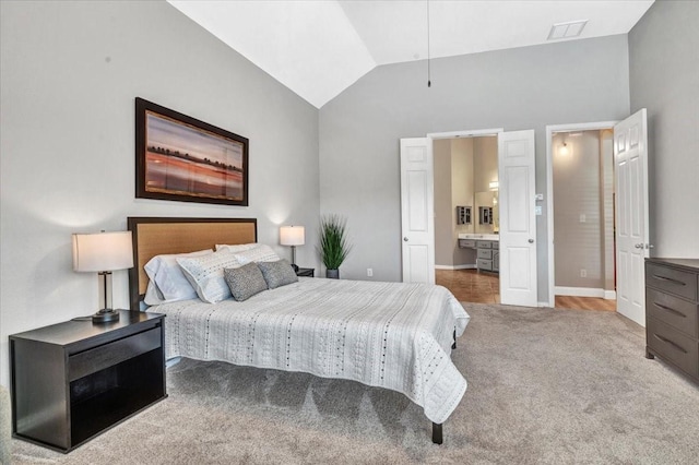 1516 Stonehill Ct, Allen, TX 75002 - bedroom featuring carpet, baseboards, ensuite bath, and high vaulted ceiling