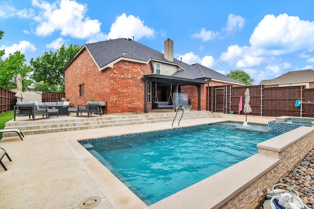 1516 Stonehill Ct, Allen, TX 75002 - view of pool featuring outdoor lounge area, a patio, a fenced backyard, and a pool with connected hot tub