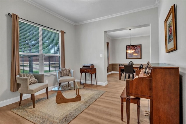 1516 Stonehill Ct, Allen, TX 75002 - sitting room with crown molding, light wood-style flooring, and baseboards