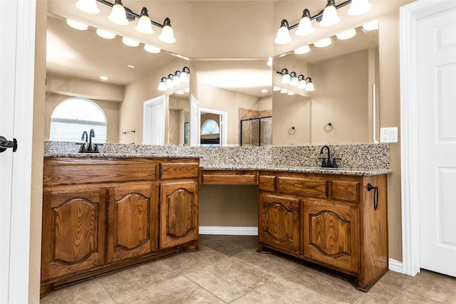1518 E Oates Rd, Garland, TX 75043 - full bathroom with vanity, a stall shower, and tile patterned floors