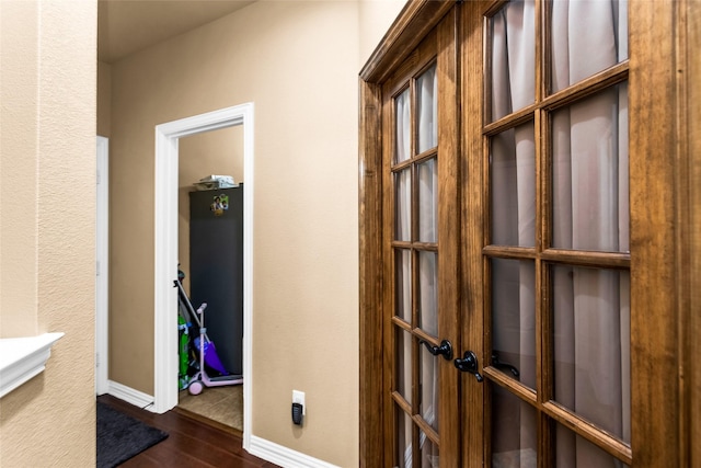 1518 E Oates Rd, Garland, TX 75043 - detailed view of wood finished floors and french doors