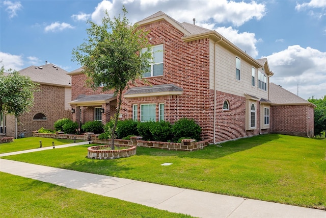 1518 E Oates Rd, Garland, TX 75043 - traditional home with brick siding and a front lawn
