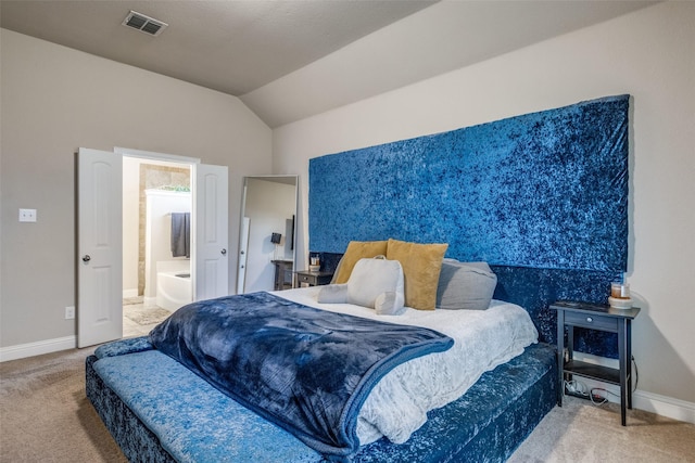 3717 Dutch Iris Ln, Forest Hill, TX 76140 - carpeted bedroom featuring vaulted ceiling, baseboards, and ensuite bath