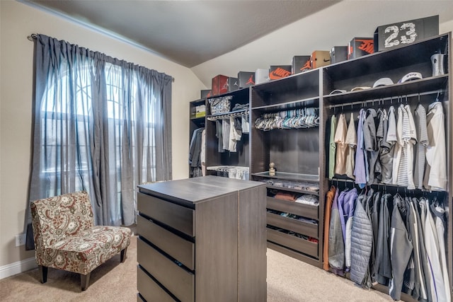 3717 Dutch Iris Ln, Forest Hill, TX 76140 - walk in closet featuring carpet and vaulted ceiling