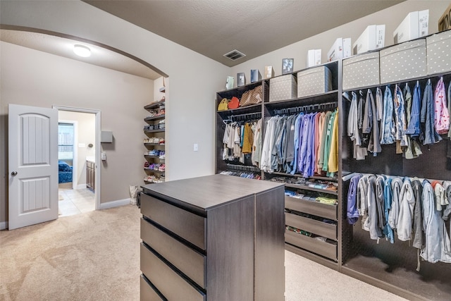 3717 Dutch Iris Ln, Forest Hill, TX 76140 - spacious closet with arched walkways and light carpet