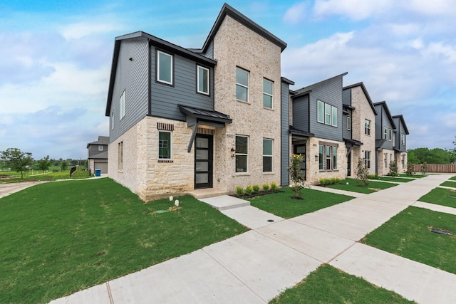 8901 Lowell St, Rowlett, TX 75089 - multi unit property featuring stone siding, a front lawn, and a residential view