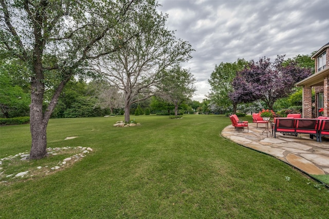 2841 Winding Creek Rd, Prosper, TX 75078 - view of grassy yard with a patio area