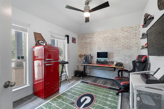 135 Pine Island Ln, Leander, TX 78641 - bedroom featuring wood finished floors, lofted ceiling, baseboards, and a ceiling fan