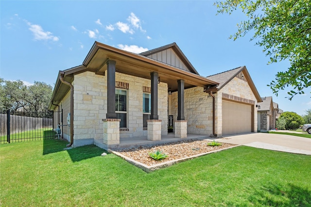 135 Pine Island Ln, Leander, TX 78641 - view of front facade with stone siding, covered porch, board and batten siding, and concrete driveway