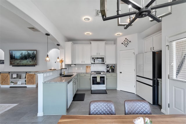 135 Pine Island Ln, Leander, TX 78641 - living area featuring ceiling fan and tile patterned floors