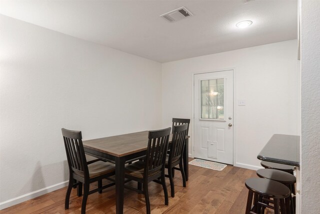 12752 Honeysuckle Cir, Eustace, TX 75124 - dining room featuring wood finished floors and baseboards
