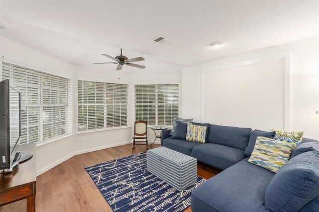 12752 Honeysuckle Cir, Eustace, TX 75124 - living room featuring ceiling fan, wood finished floors, and healthy amount of natural light