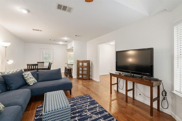 12752 Honeysuckle Cir, Eustace, TX 75124 - living area with wood finished floors and healthy amount of natural light