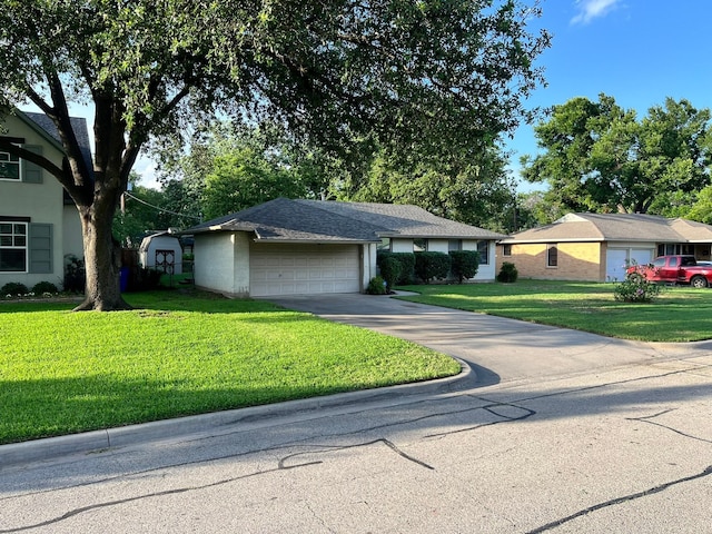 2969 Eric Ln, Farmers Branch, TX 75234 - single story home featuring a front lawn, driveway, and a garage