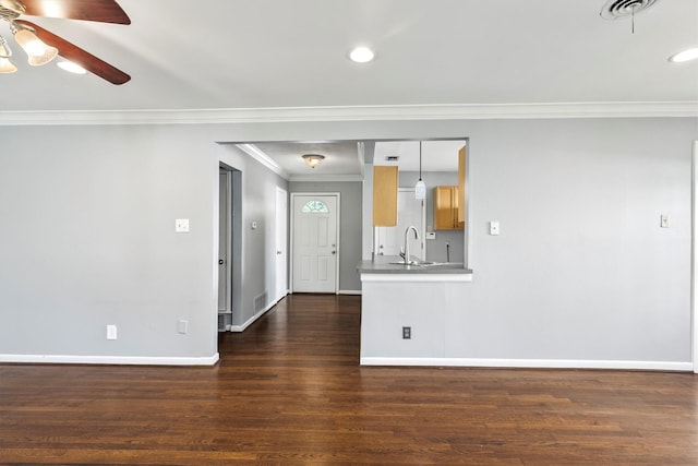 2969 Eric Ln, Farmers Branch, TX 75234 - unfurnished living room with crown molding, a ceiling fan, dark wood-style flooring, and recessed lighting