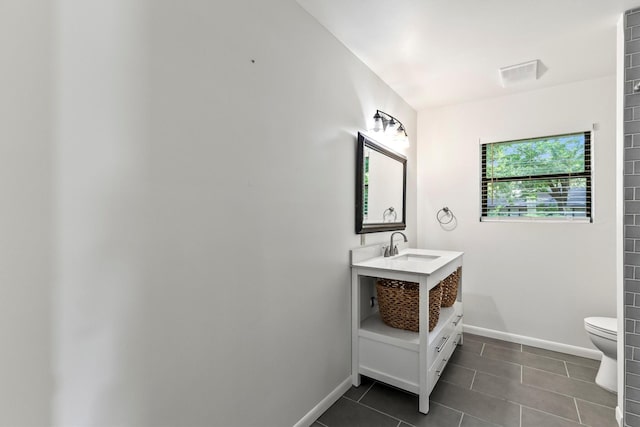 2969 Eric Ln, Farmers Branch, TX 75234 - bathroom with vanity and tile patterned flooring