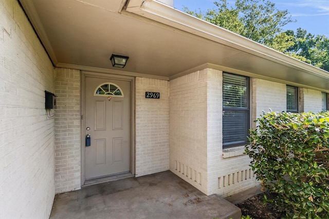 2969 Eric Ln, Farmers Branch, TX 75234 - entrance to property featuring brick siding