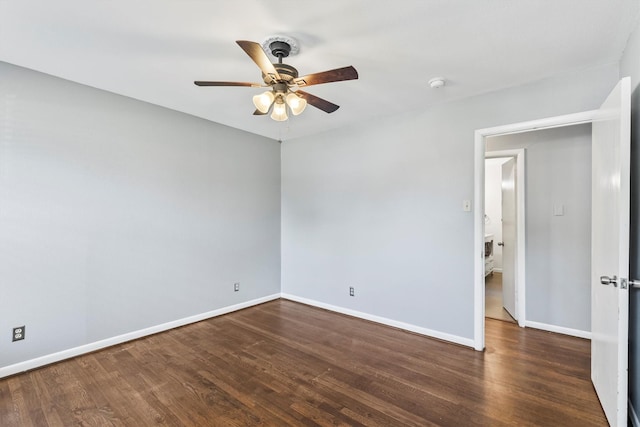 2969 Eric Ln, Farmers Branch, TX 75234 - spare room featuring a ceiling fan, wood finished floors, and a smoke detector