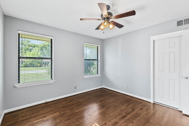 2969 Eric Ln, Farmers Branch, TX 75234 - empty room with a ceiling fan and wood finished floors