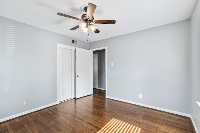 2969 Eric Ln, Farmers Branch, TX 75234 - unfurnished bedroom featuring wood finished floors, ceiling fan, and a closet