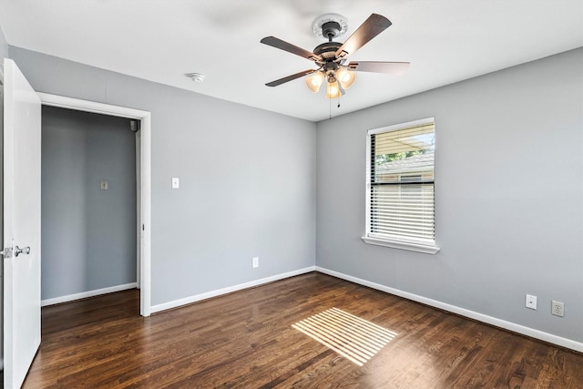 2969 Eric Ln, Farmers Branch, TX 75234 - unfurnished room featuring a smoke detector, wood finished floors, and a ceiling fan