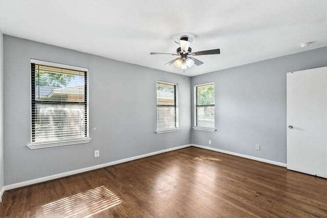 2969 Eric Ln, Farmers Branch, TX 75234 - spare room featuring wood finished floors, a ceiling fan, and a smoke detector