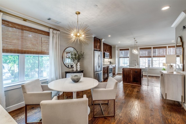 4121 Grassmere Ln Unit 3, University Park, TX 75205 - dining area featuring baseboards, dark wood-style floors, a chandelier, crown molding, and recessed lighting