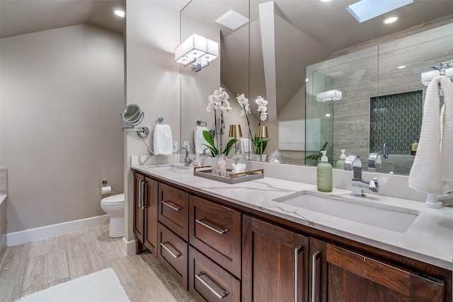 4121 Grassmere Ln Unit 3, University Park, TX 75205 - full bath with vaulted ceiling, toilet, double vanity, tiled shower, and baseboards