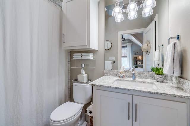 4121 Grassmere Ln Unit 3, University Park, TX 75205 - full bathroom featuring vanity, toilet, a chandelier, ceiling fan, and a shower with curtain