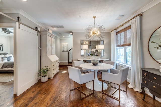 4121 Grassmere Ln Unit 3, University Park, TX 75205 - dining room featuring a barn door, dark wood-style flooring, a chandelier, and baseboards