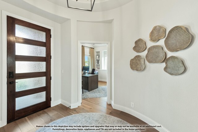 411 Atlas Cedar Dr, Glenn Heights, TX 75154 - entryway featuring wood finished floors and baseboards